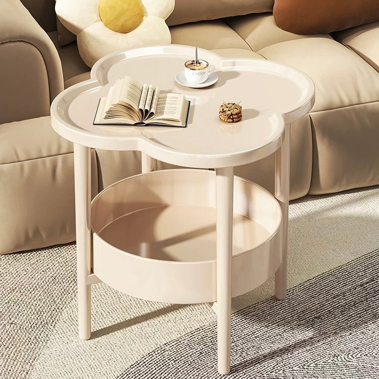 Plastic clover-shaped small table with double shelves for books and remotes