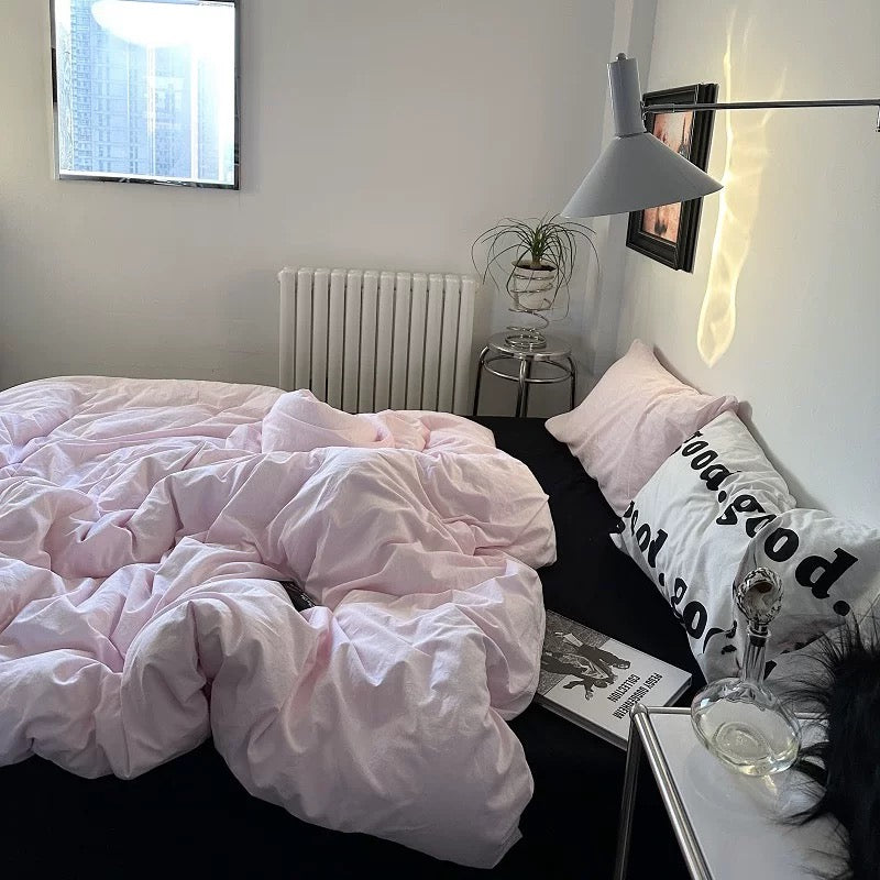 Aesthetic pastel pink cotton bedding with modern decor and clean girl vibe.