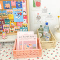 Small foldable pastel storage crates for desks