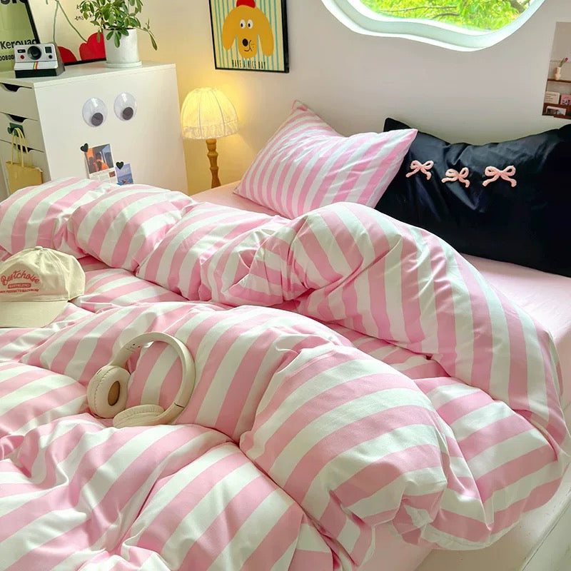 Pillowcases from the set arranged on the bed, complementing the overall aesthetic