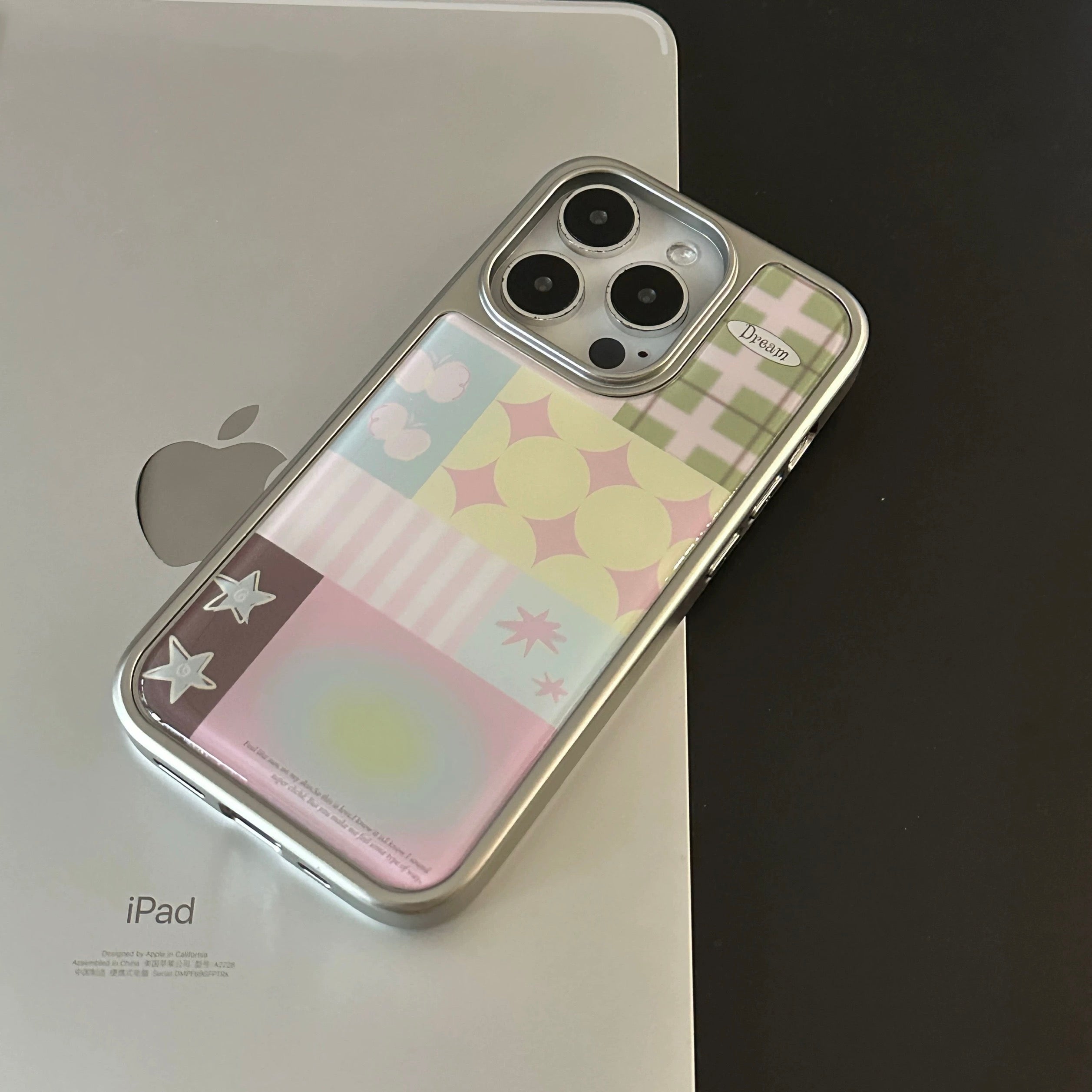 Plating lens frame detail on pastel aesthetic iPhone case for added camera protection
