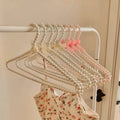 Elegant pearl hangers for boutique display