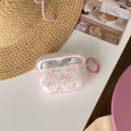 Pink Bow AirPods Pro case with keychain attachment, blending functionality with trendy design