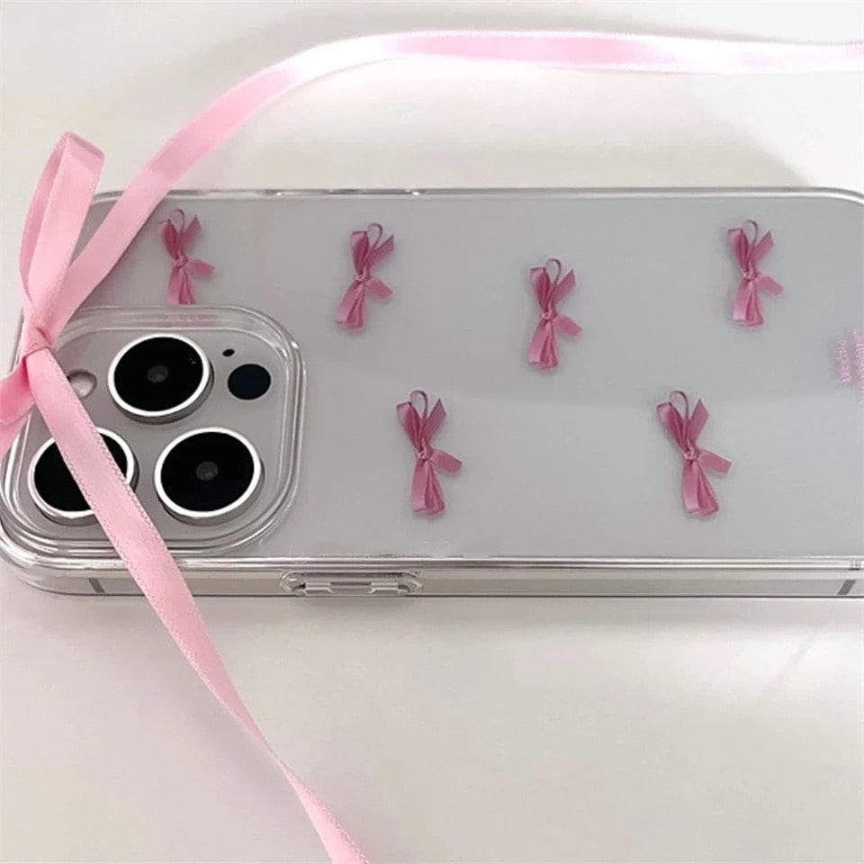 Clear aesthetic iPhone case with adorable pink bow