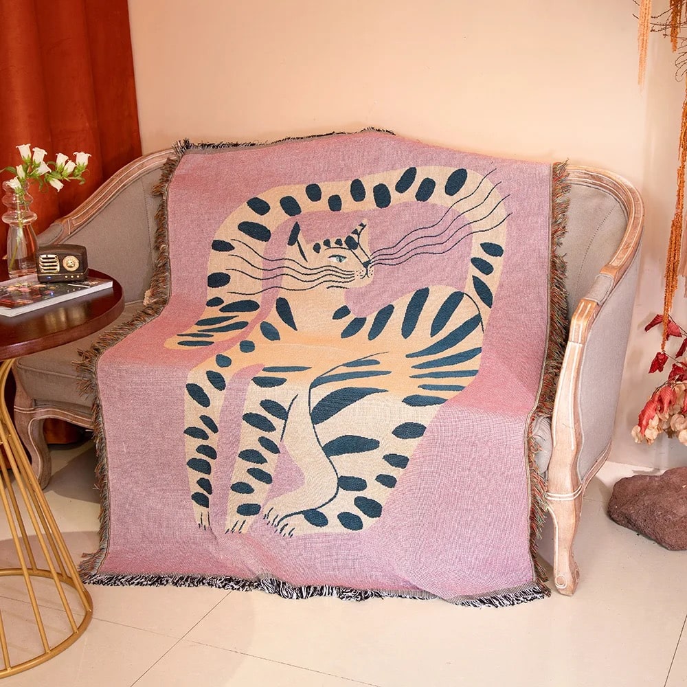 Pink Cat Tassel Throw Blanket on Bed with Boho Chic Design