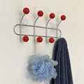 Wall mounted hooks for coats, backpacks, and hats in retro style