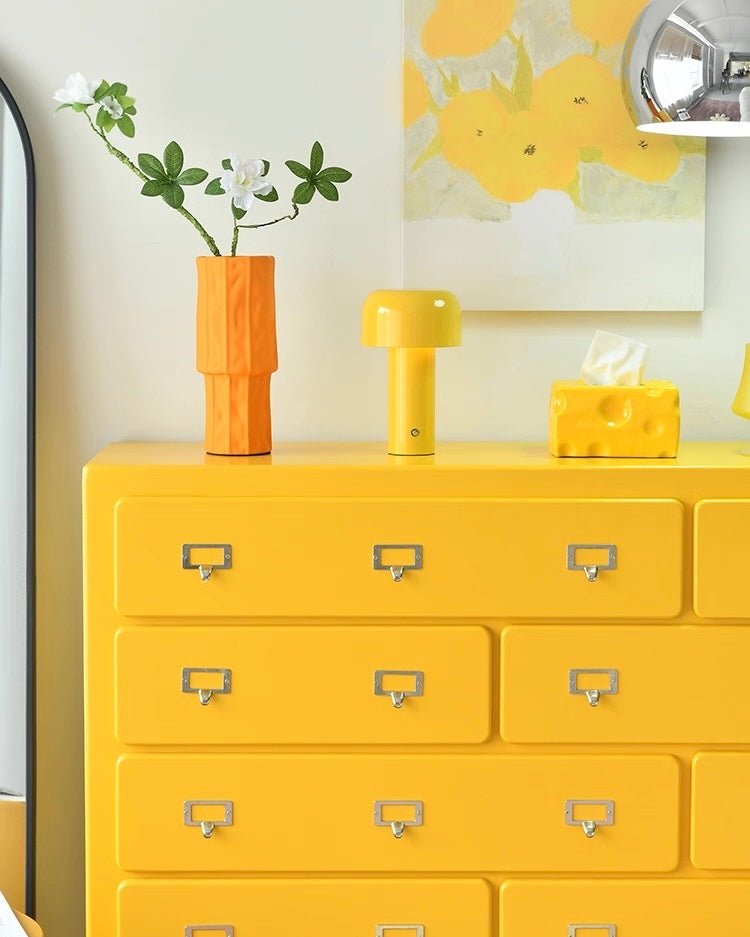 Pastel dopamine pink drawer cabinet styled for cute modern interior decor