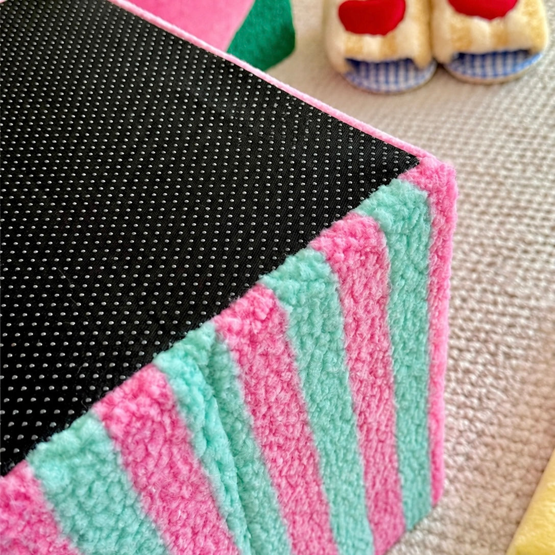 Close-up of striped side panel on the heart storage stool