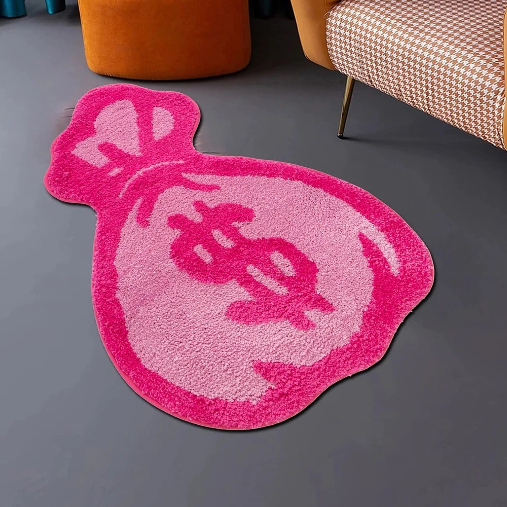 Tufted rug featuring a playful money bag design in pink, perfect for game room decor.