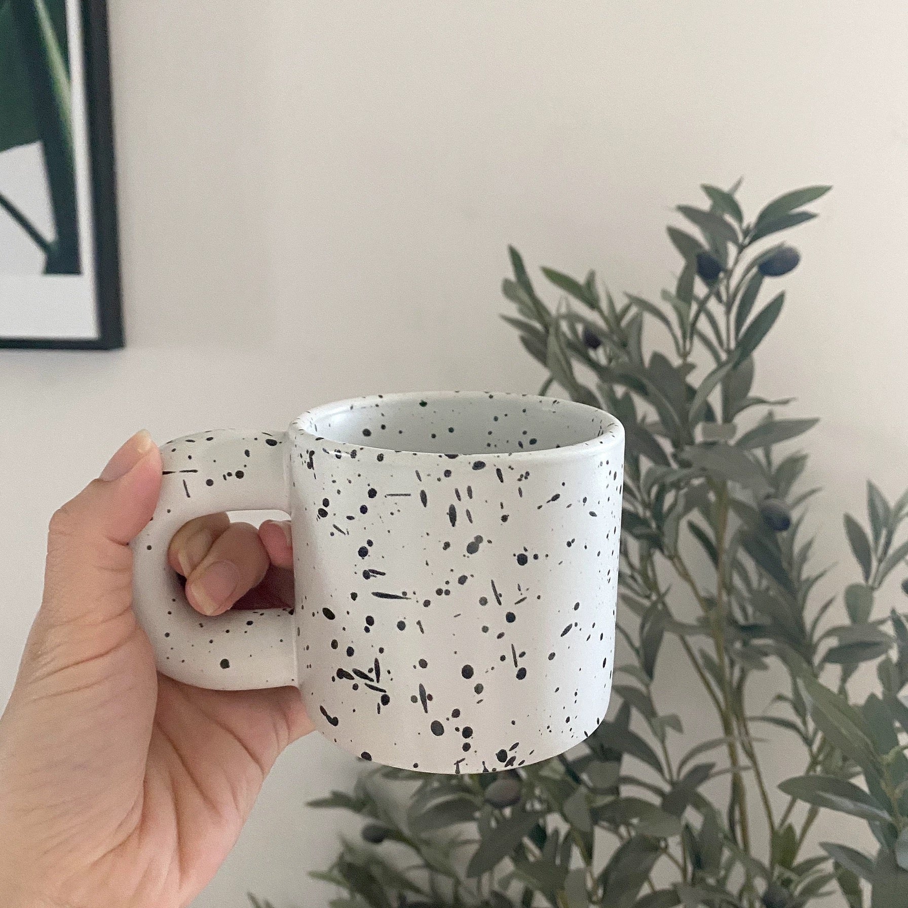 Stylish ink splatter mug for modern kitchen