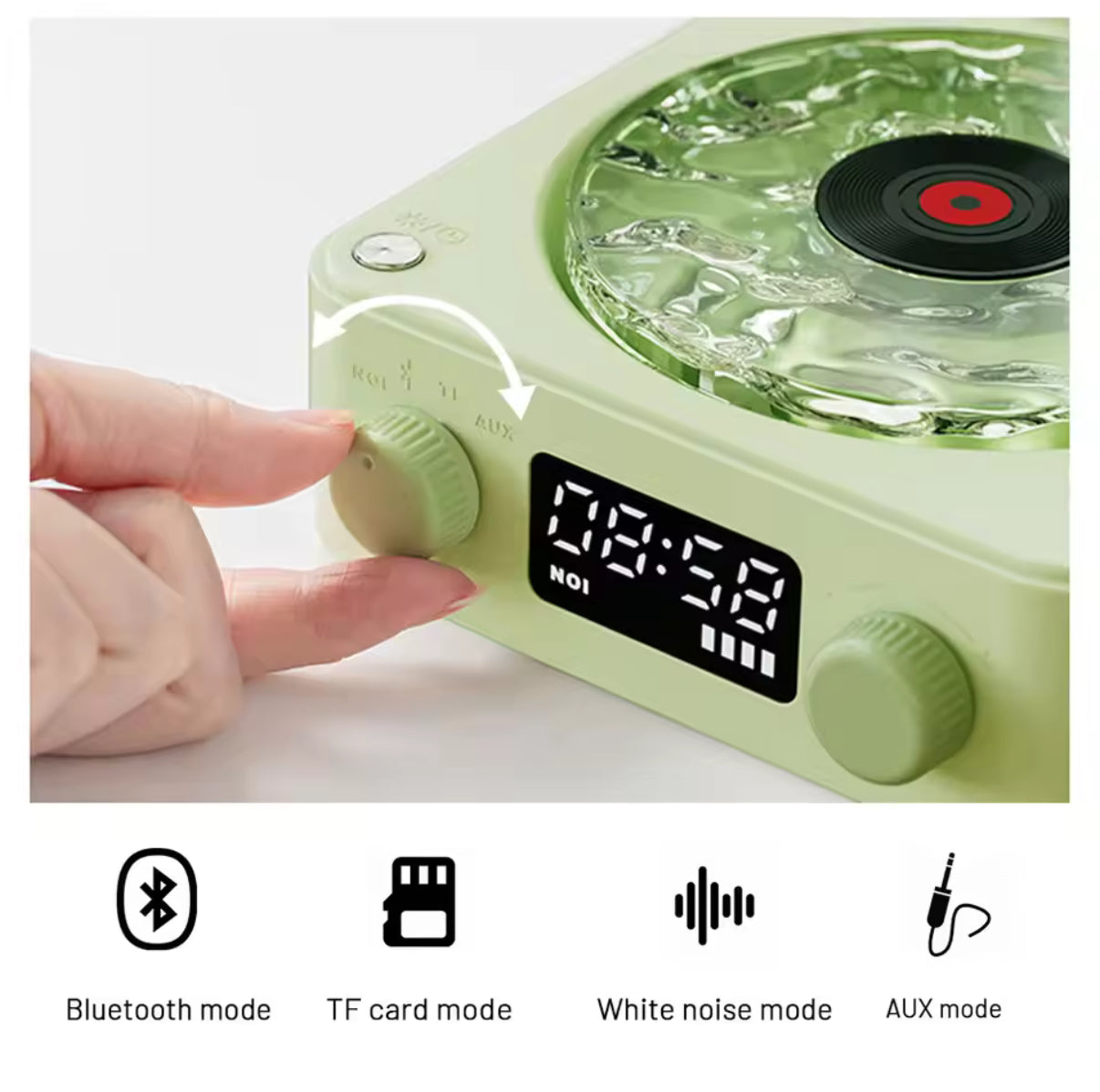 Green electronic device with digital display and control knobs on a white background