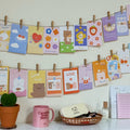 Adorable pastel decorative cards for creating a cozy and personalized wall display in bedrooms or dorms