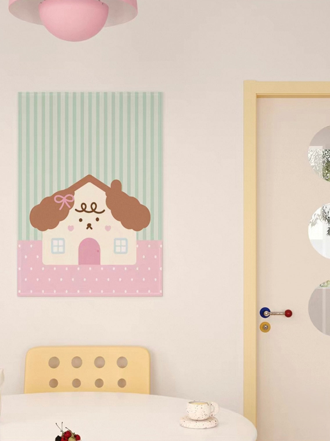 A puppy house tapestry combines a brown dog shaped roof, a pink door, green stripes and a pink dotted panel.