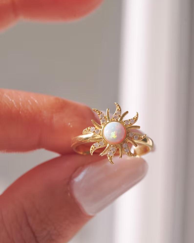 Elegant opal ring with sun-inspired design