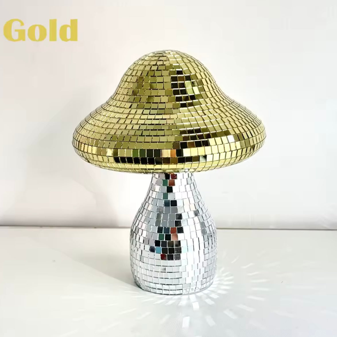 Handmade mushroom ornament on textured fabric background