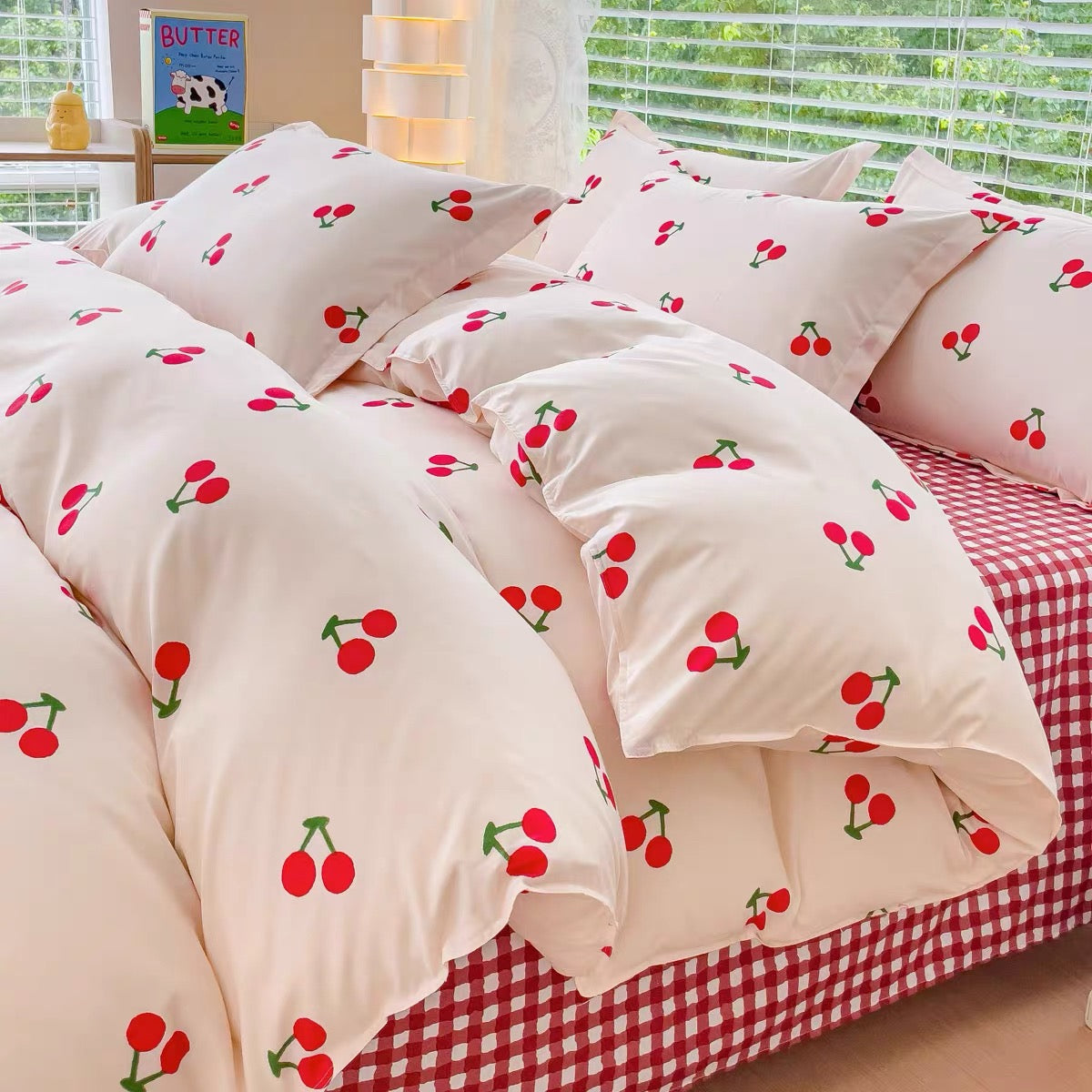 Aesthetic cherry bedding set in red and white for preppy dorm room style.