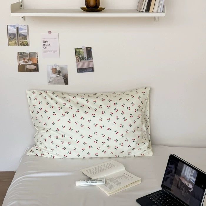 Cozy aesthetic dorm room featuring gingham cotton pillowcase with pastel bedding.