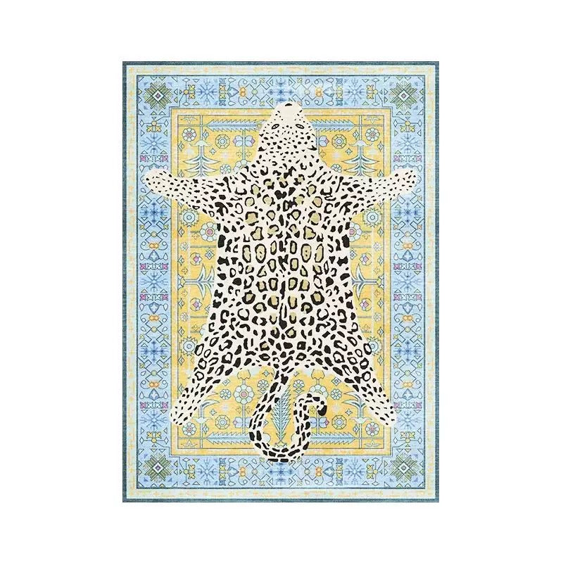 Blue leopard print carpet with geometric boho border and tiger motif