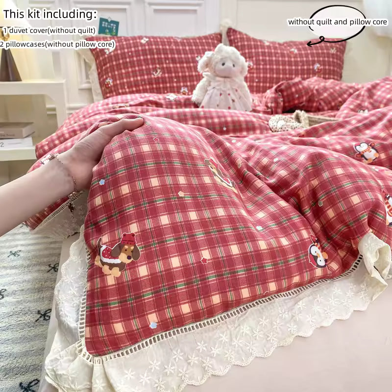 Close-up of lace-trim red checkered bedding set for cozy cottagecore decor.
