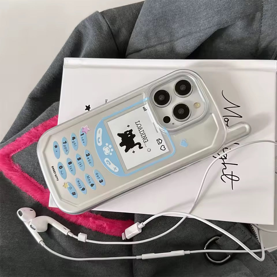 Phone case with loading screen design, glasses, panda mask, and book on a white surface