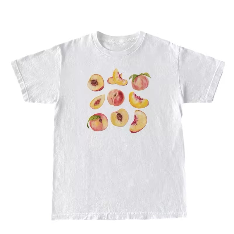 Nine peaches graphic tee for women. Cottagecore aesthetic slim-fit short sleeve top perfect for casual summer and Harajuku-inspired looks.