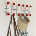 Pink coat rack with multi-functional hooks for home organization