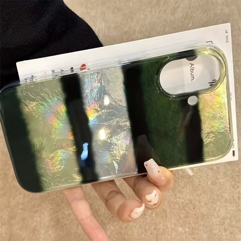 Holographic phone case with clear cover held by a person