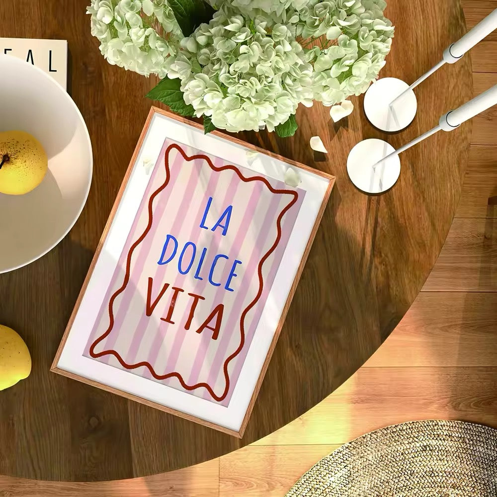La Dolce Vita canvas art hanging in a pastel-themed dorm room, complementing the decor.