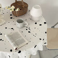 Retro and vintage-inspired ink splatter tablecloth for kitchen decor