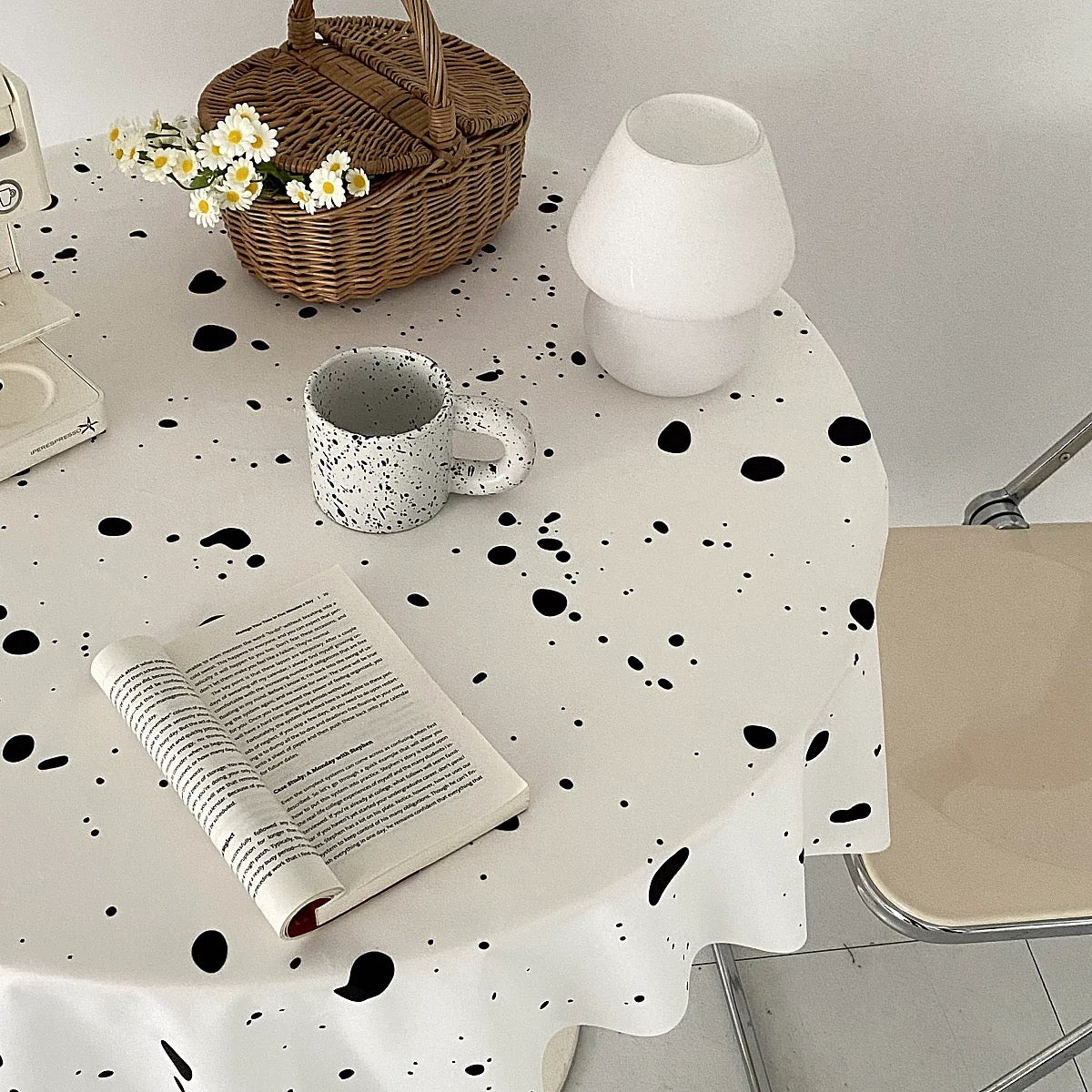 Retro and vintage-inspired ink splatter tablecloth for kitchen decor