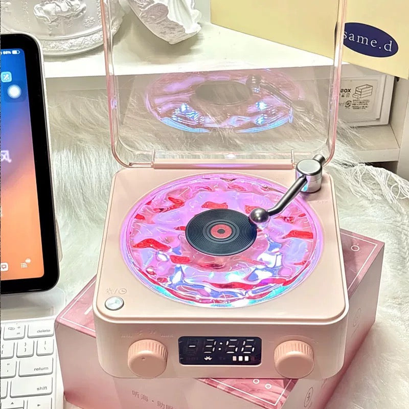 Cute mini vinyl record player with colorful LED lighting, ideal for aesthetic spaces