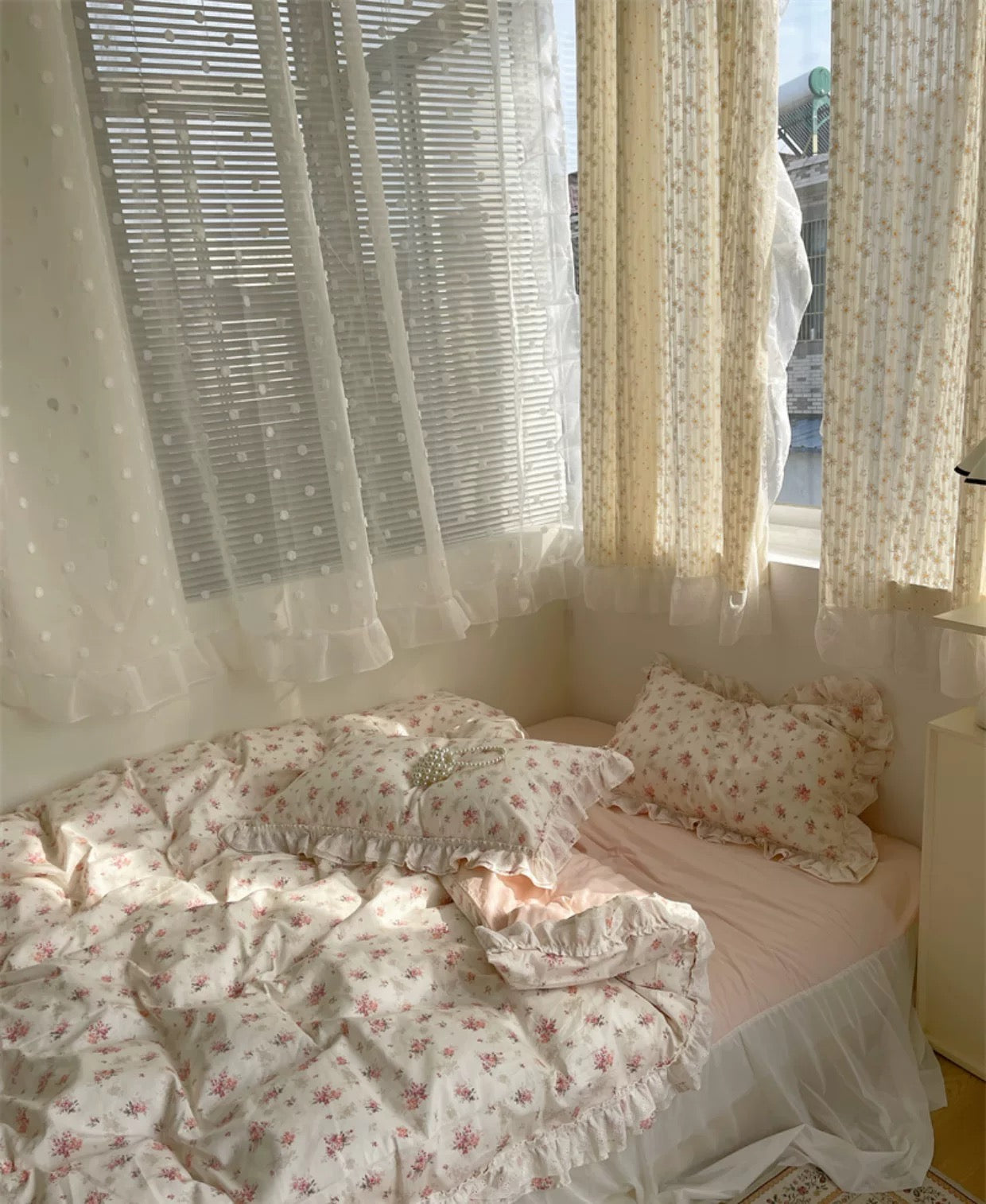 Twin floral bedding set with lace ruffle sham on cozy cottagecore bed