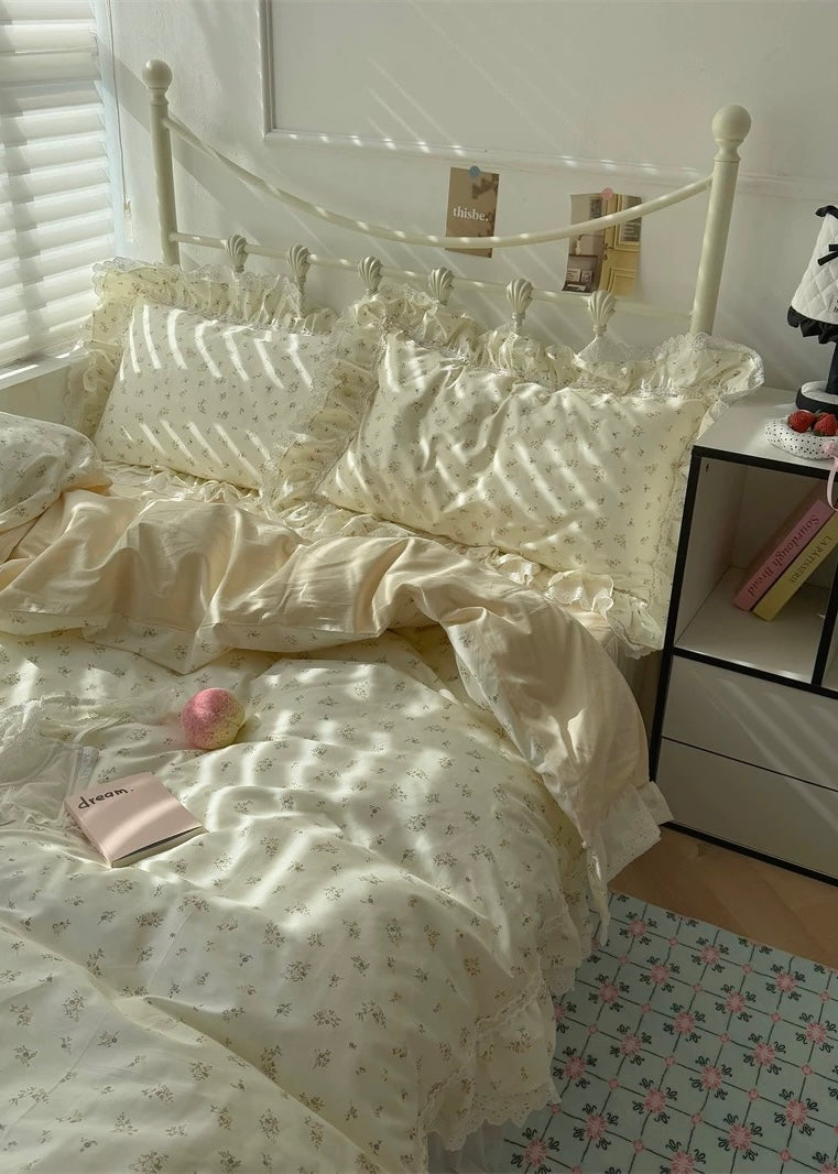 Neatly made bed with white bedding in a bright room