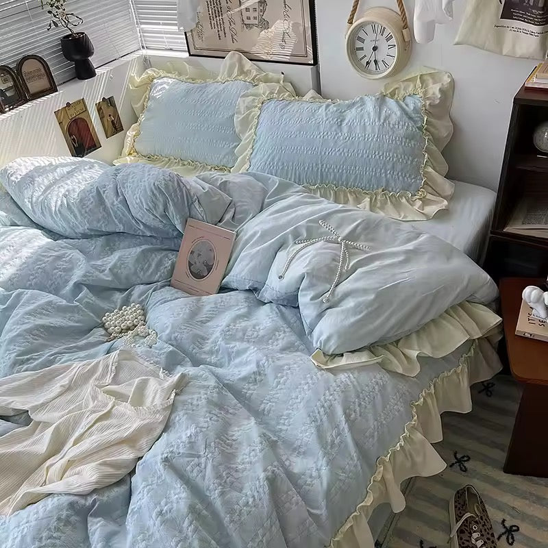 Aesthetic seersucker bedding in soft lilac, styled with lace pillowcases