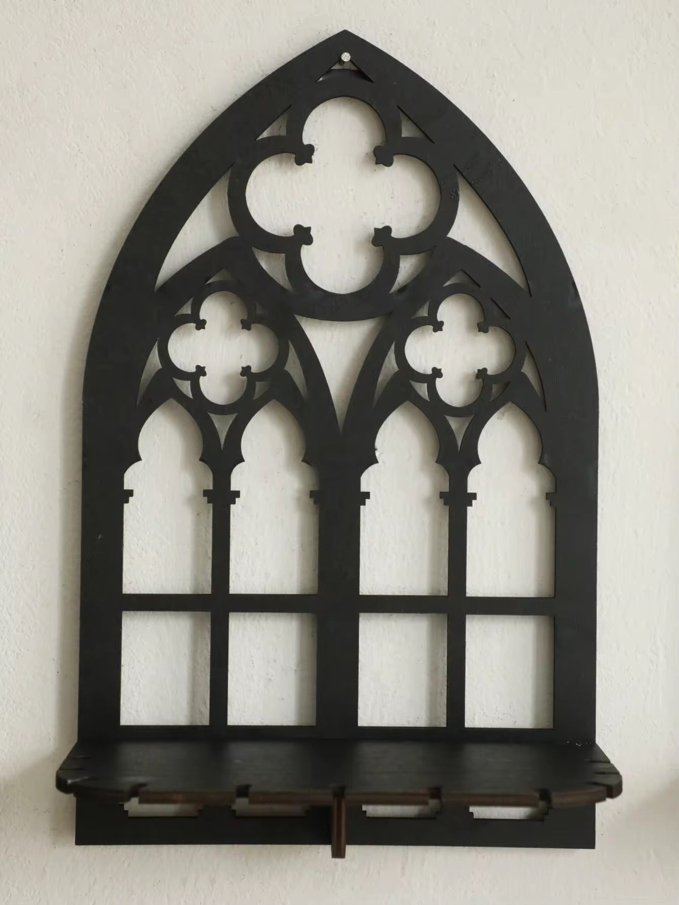 Vintage wooden gothic shelf for displaying crystal