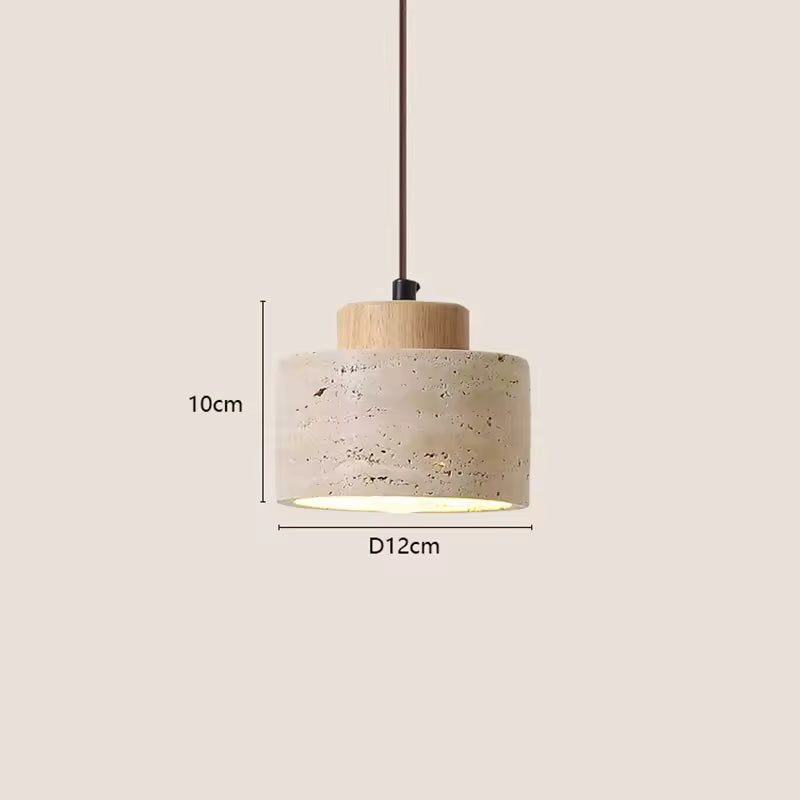 Stone and wood pendant light with warm downward glow for Japandi bedroom lighting setup.
