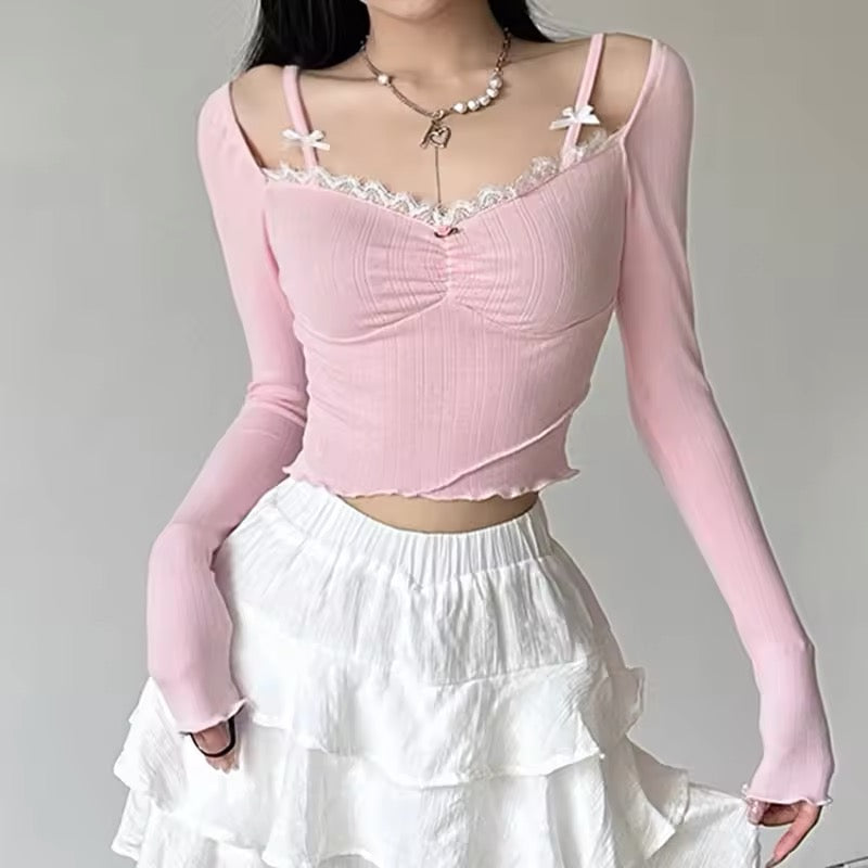 Soft girl pink top with delicate bow accents