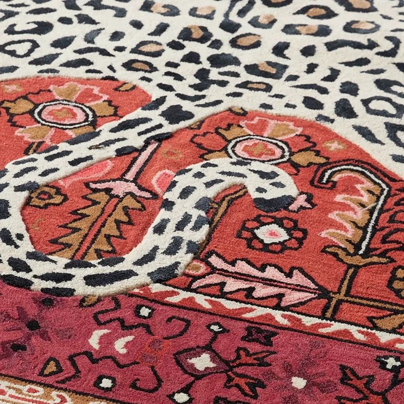 Red background boho rug with large white tiger center and details