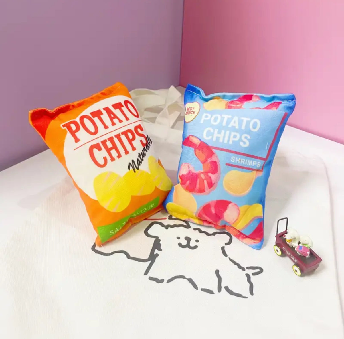 Squeaky chew toy for pets, designed like a potato chip