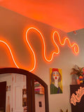 Squiggle neon rope LED lights, adding a funky vibe to your Y2K-inspired space.