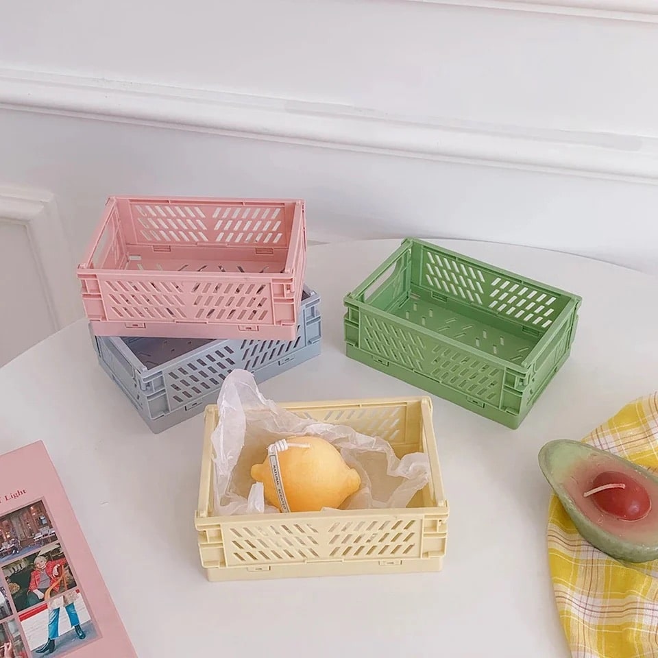 Compact pastel-colored storage crates for desk