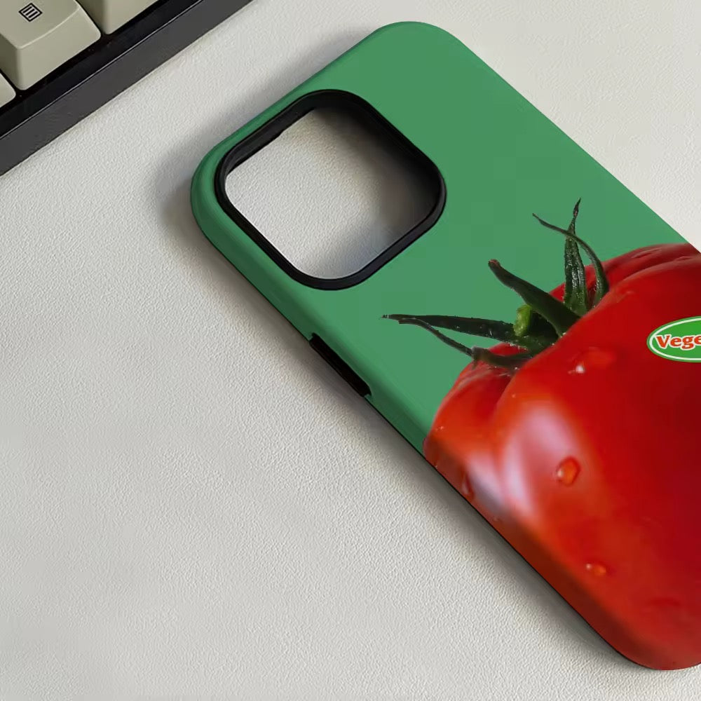 Tomato iPhone case in mirror selfie setup with soft lighting