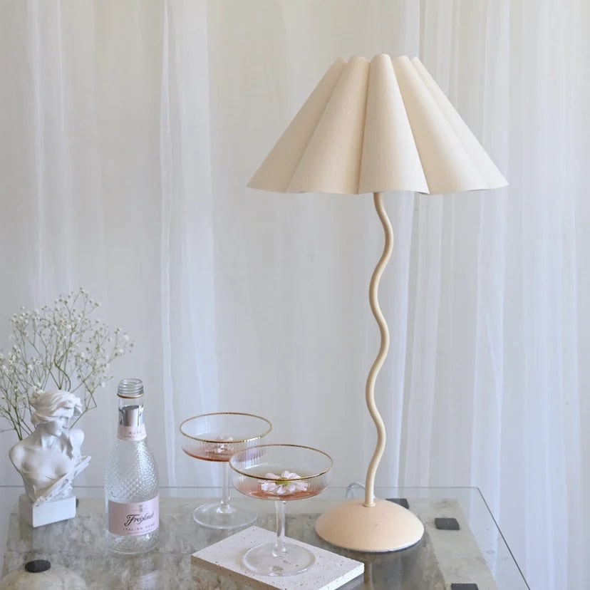 Elegant tulip bedside lamp with wrought iron base and pleated shade