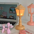 Retro-inspired mini LED desk lamp with touch control.