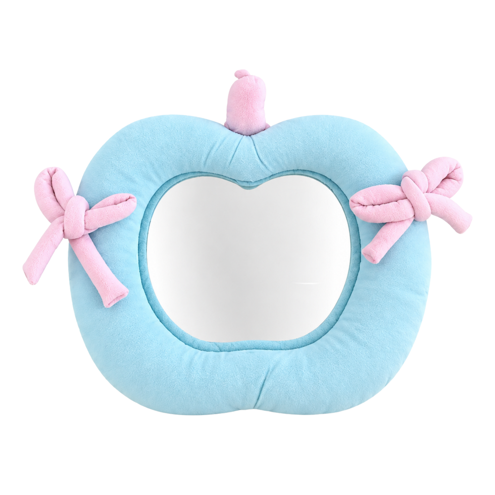 Blue apple shaped wall mirror with pink bows from The Feelz