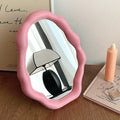 Aesthetic coquette-style mirror with wave design