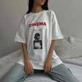 Vintage cinema t-shirt with oversized letter print. Casual Y2K streetwear graphic tee for women’s Harajuku and punk grunge summer looks.