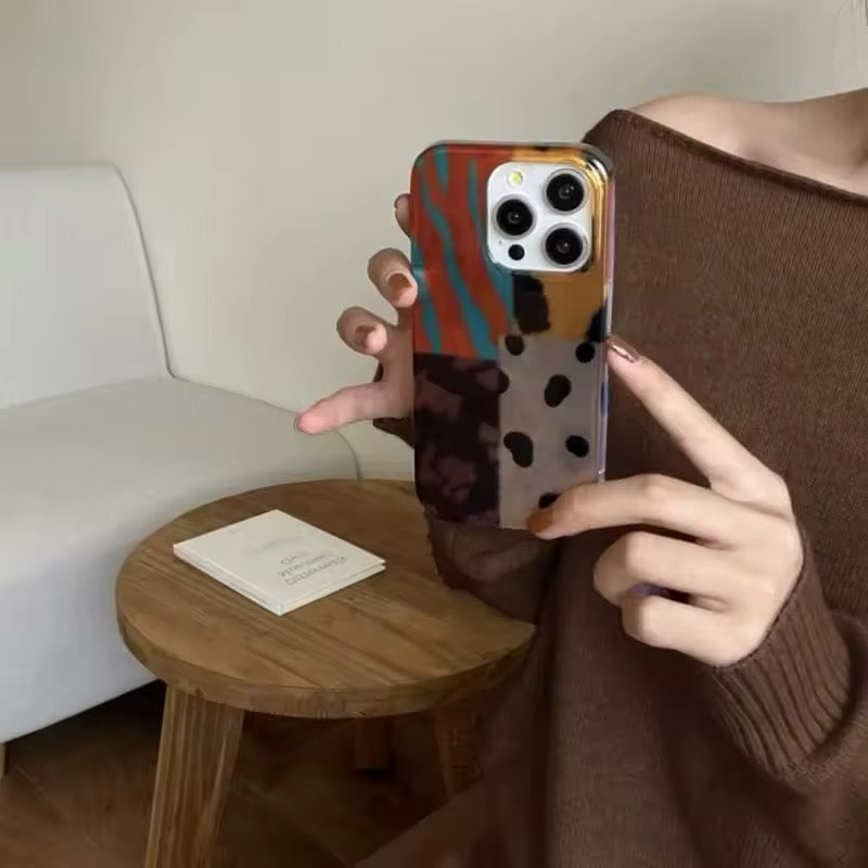 Vintage-inspired amber leopard patchwork phone case