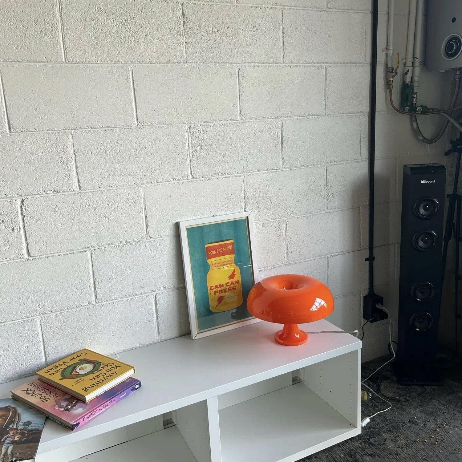 Vintage mushroom lamp with white and orange design. Decorative Bauhaus bedside lamp for modern and minimalist interiors.