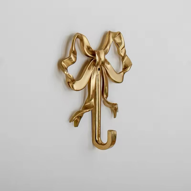 Vintage-inspired brass bow-knot wall hook for coquette decor